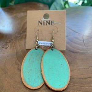 Genuine leather painted sea foam green oval shaped earrings